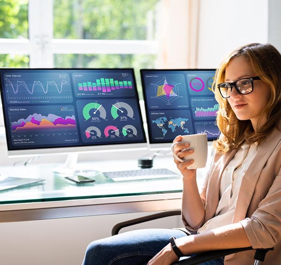Analyst Woman Looking At Business Data Analytics Dashboard
